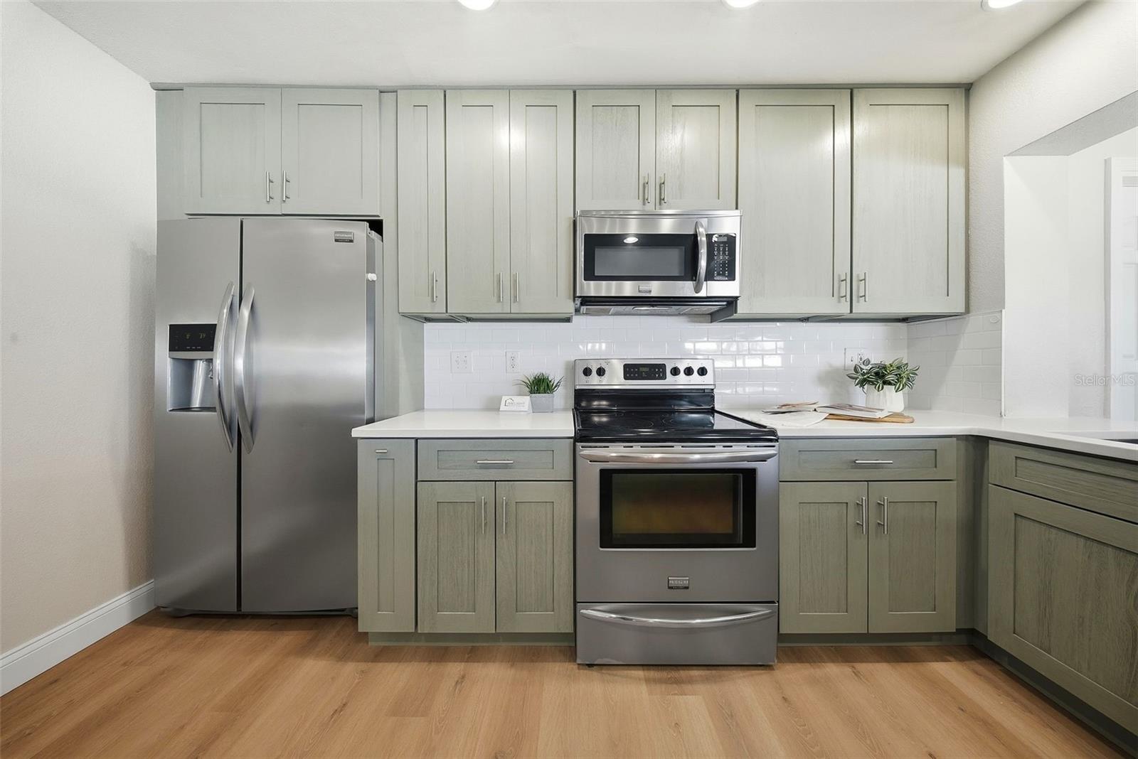 New stainless steel appliances and a wine fridge too!