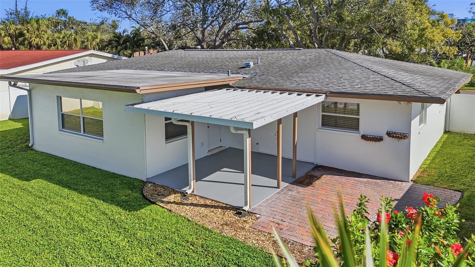 Covered lanai space with space for your grill