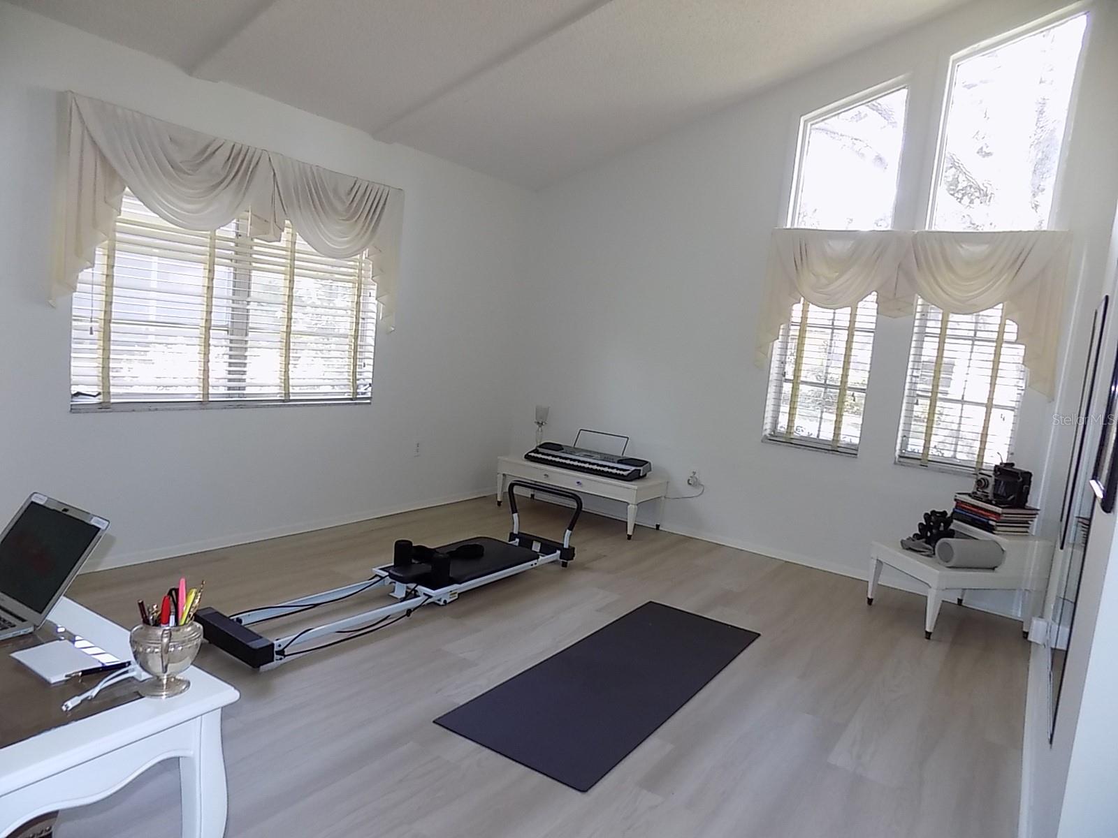 Front "flex" room makes a great den/home office, etc. or guest area/possible 3rd bedroom