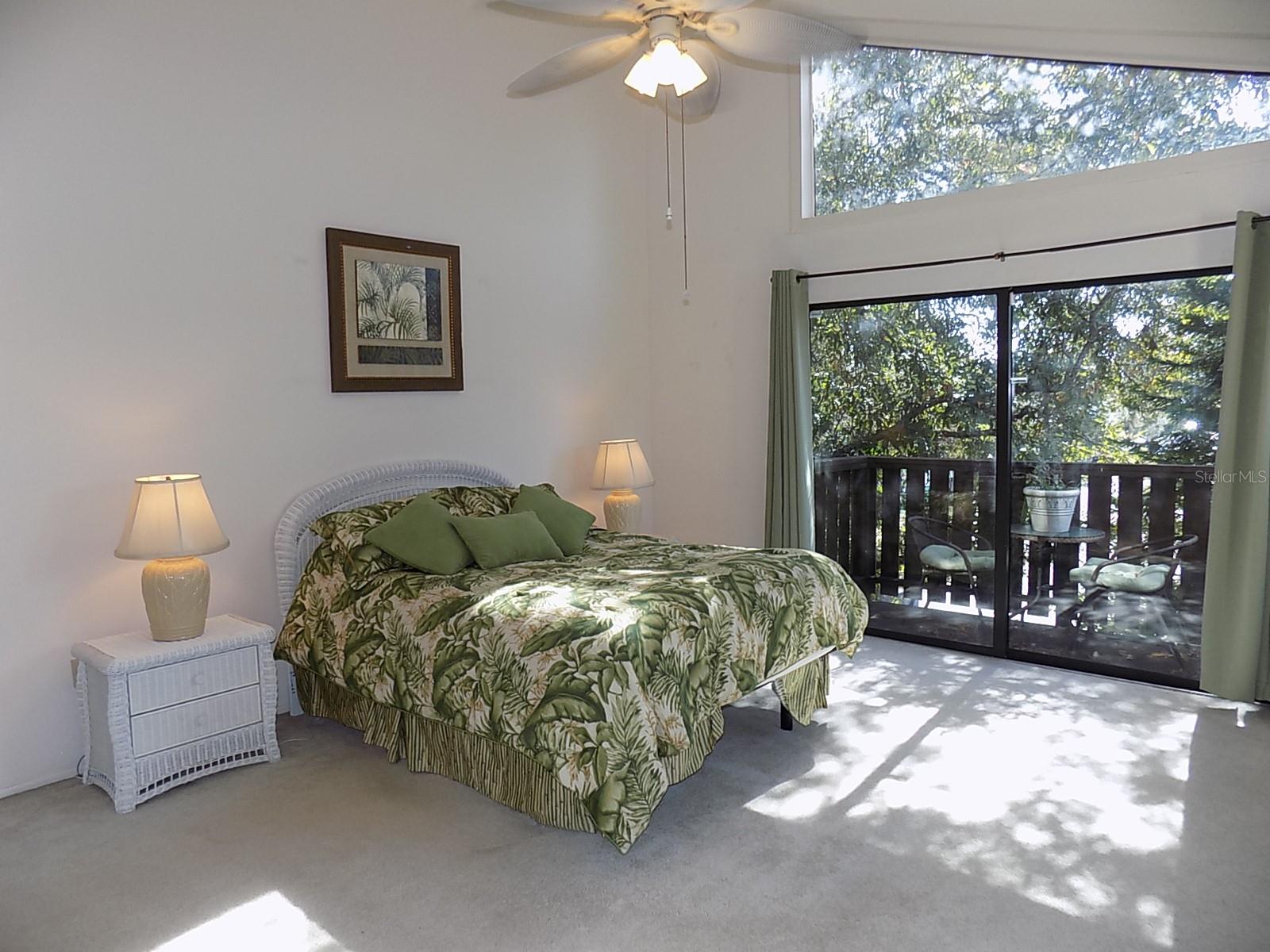 Upstairs Bedroom with high ceiling