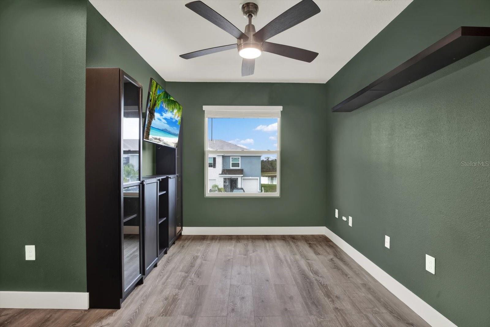 LOFT UPSTAIRS WITH LIBRARY SHELVING