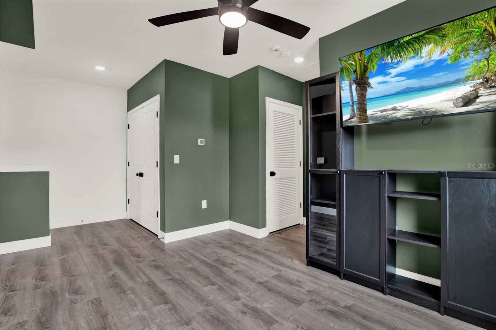 LOFT UPSTAIRS WITH LIBRARY SHELVING