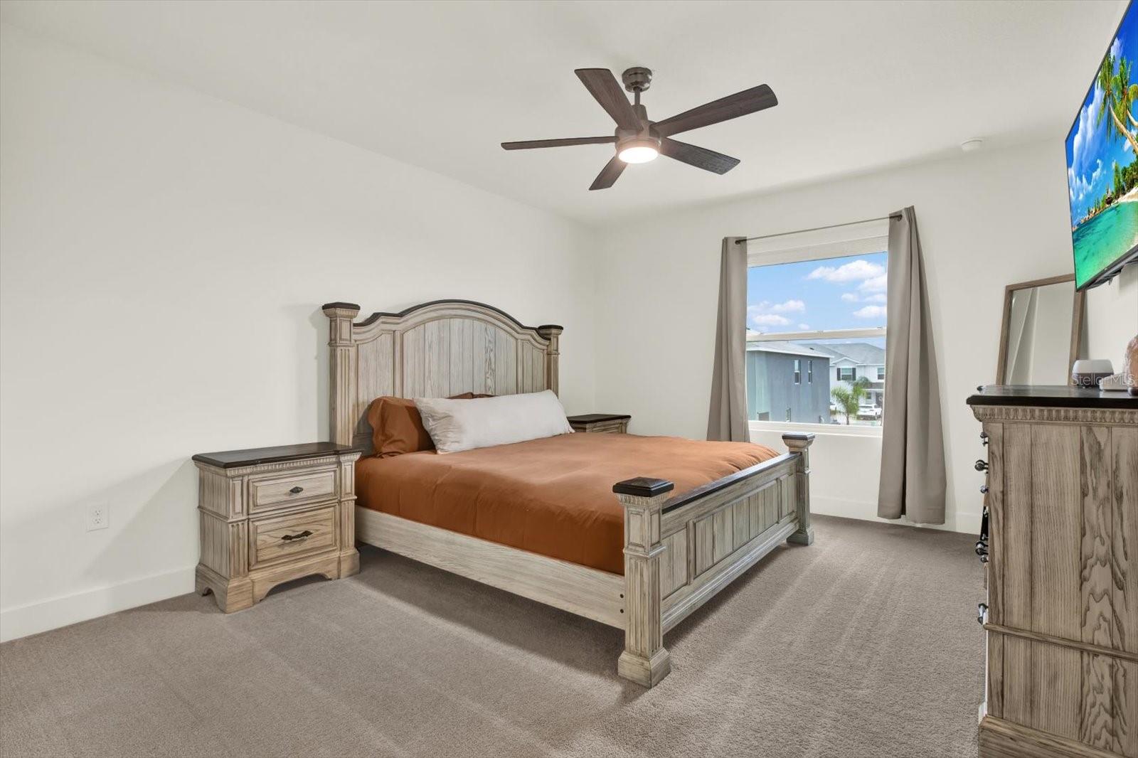 PRIMARY BEDROOM WITH TWO WALK IN CLOSETS