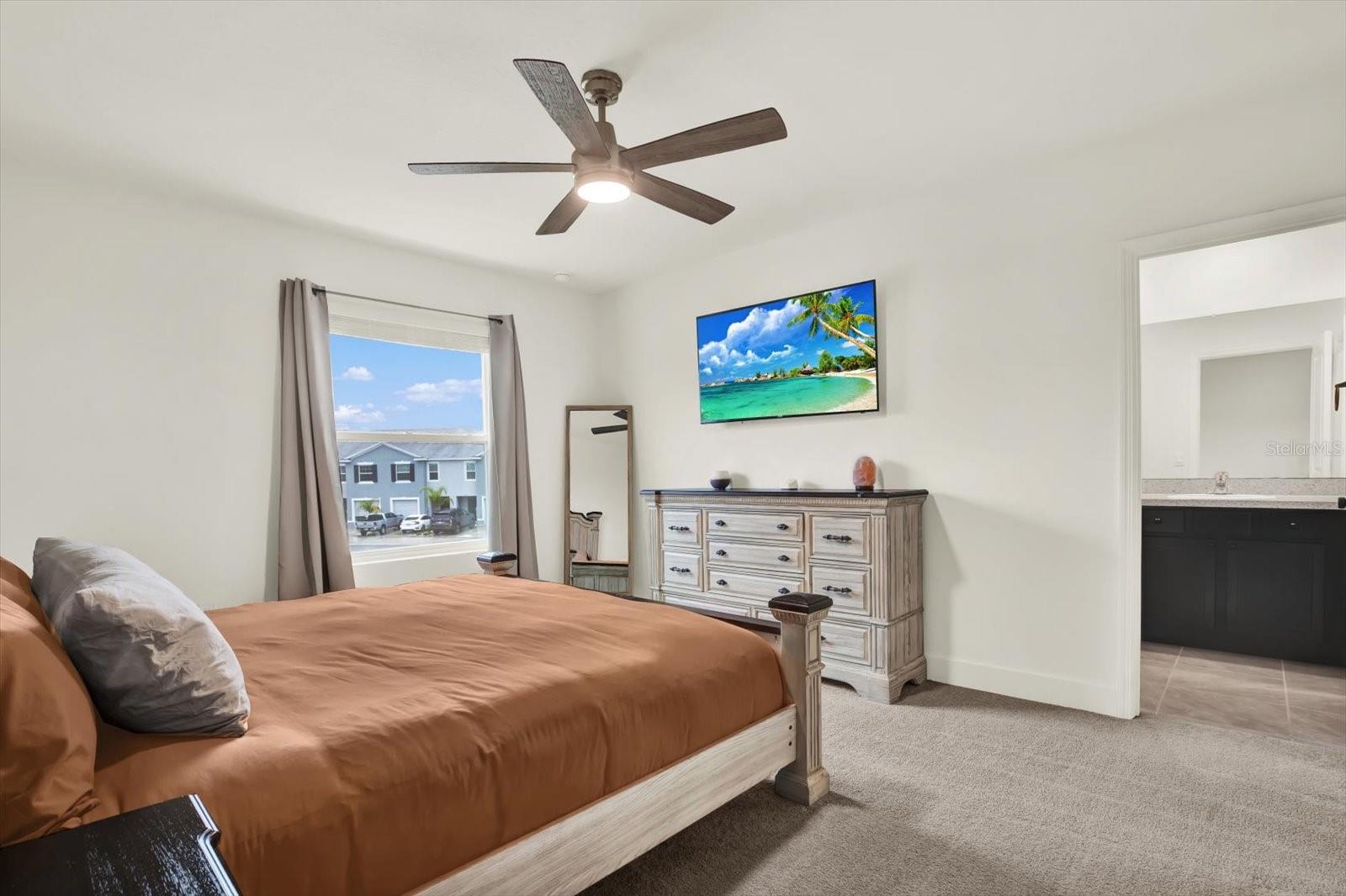PRIMARY BEDROOM WITH TWO WALK IN CLOSETS