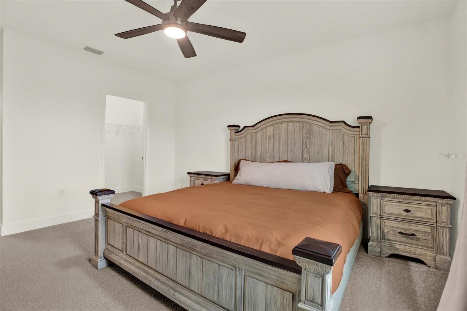 PRIMARY BEDROOM WITH TWO WALK IN CLOSETS