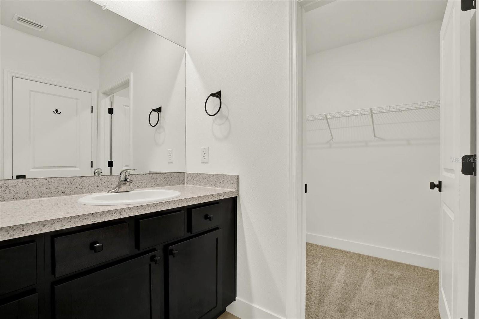 PRIMARY BATH WALK IN CLOSET