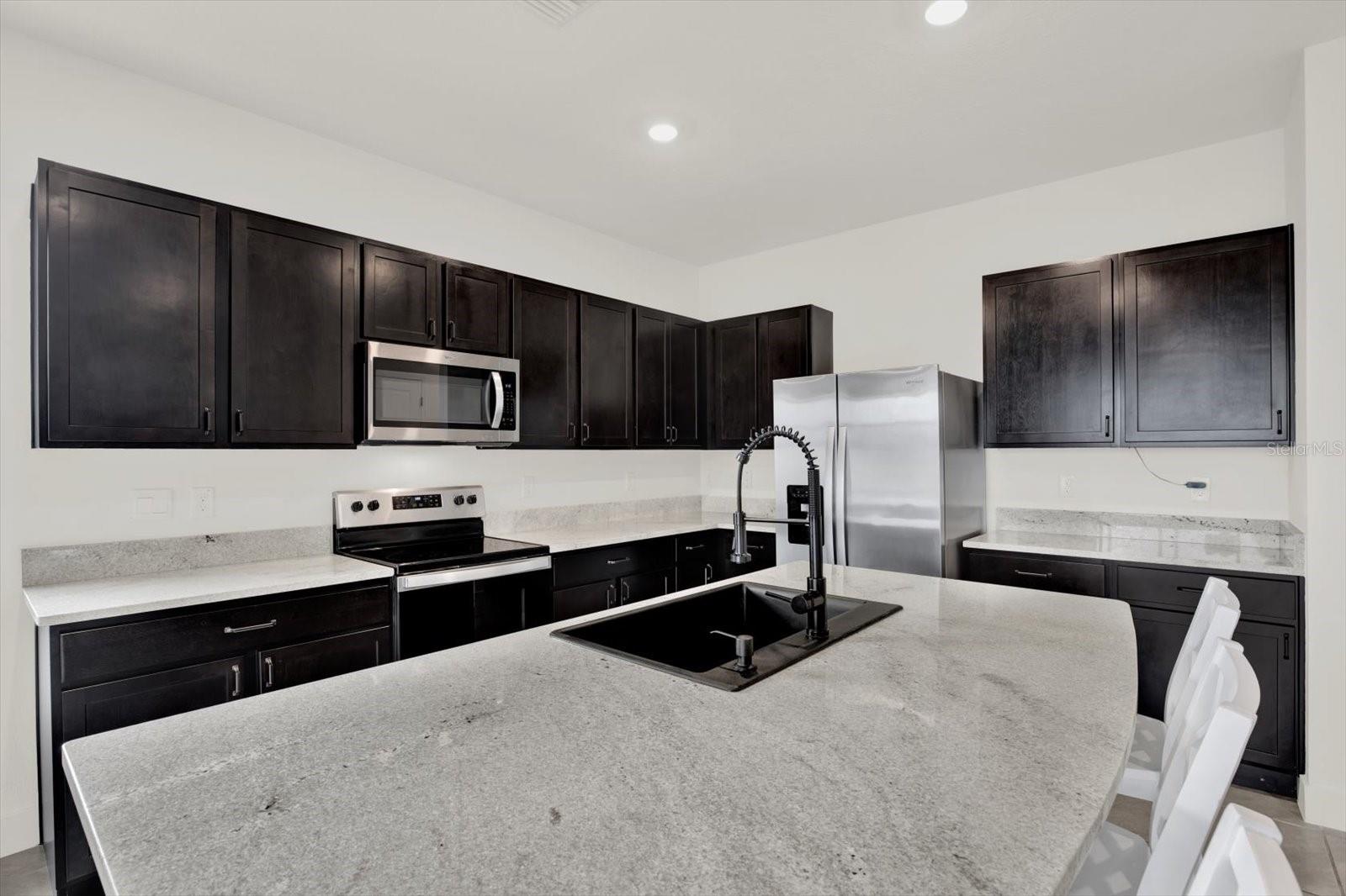 KITCHEN WITH UPGRADED SINK AND DISPOSAL