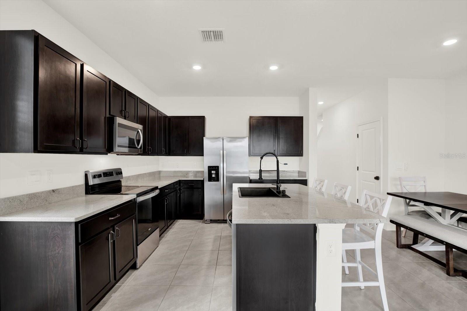 ITCHEN WITH UPGRADED SINK AND DISPOSAL