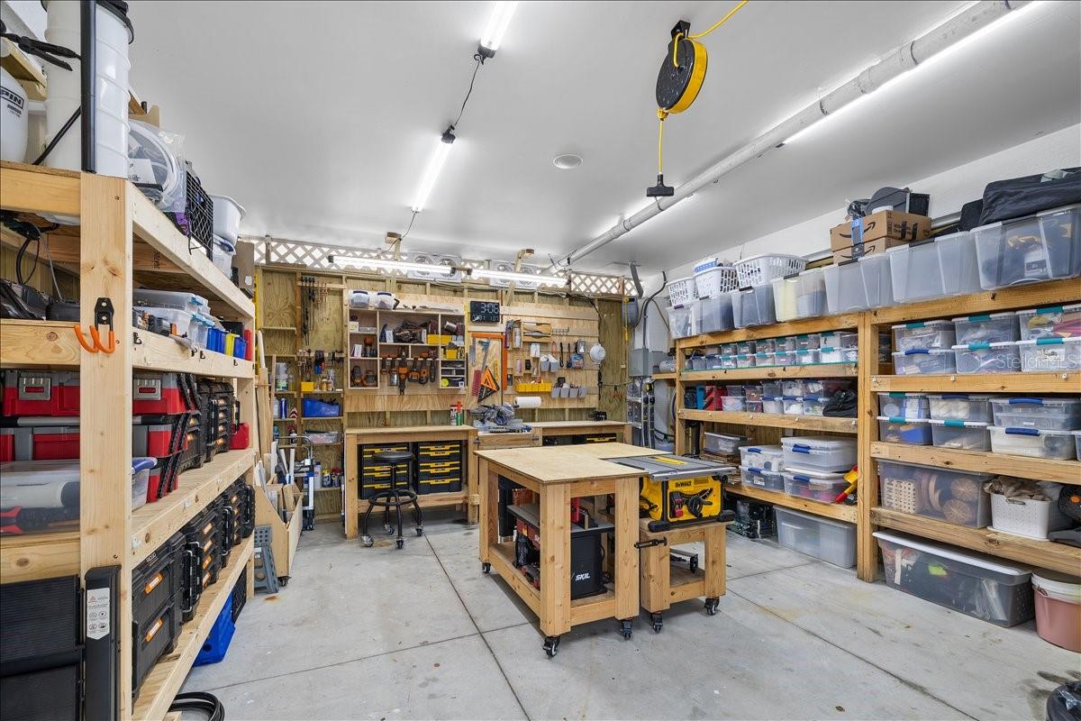 Storage Shed Building with workshop & Custom Shelving