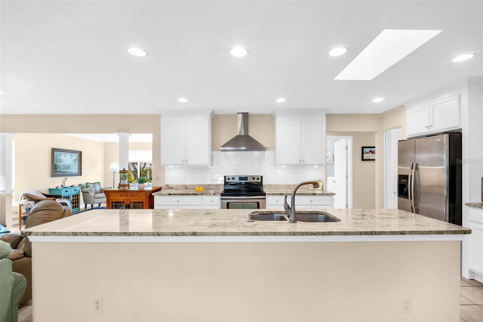 Massive kitchen island making entertaining & food prep a breeze~