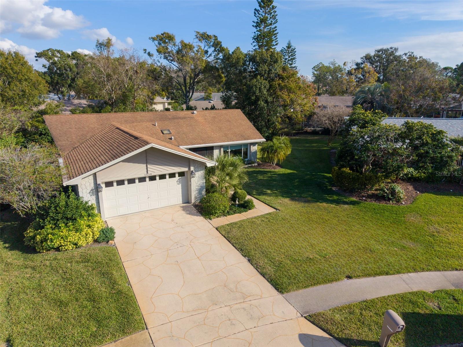Lush landscaping for privacy and a cost-saving deep well~