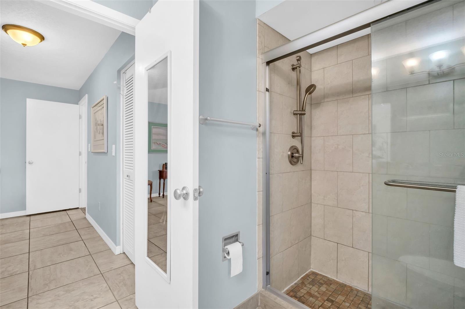 Updated walk-in shower with beautiful glass slider~
