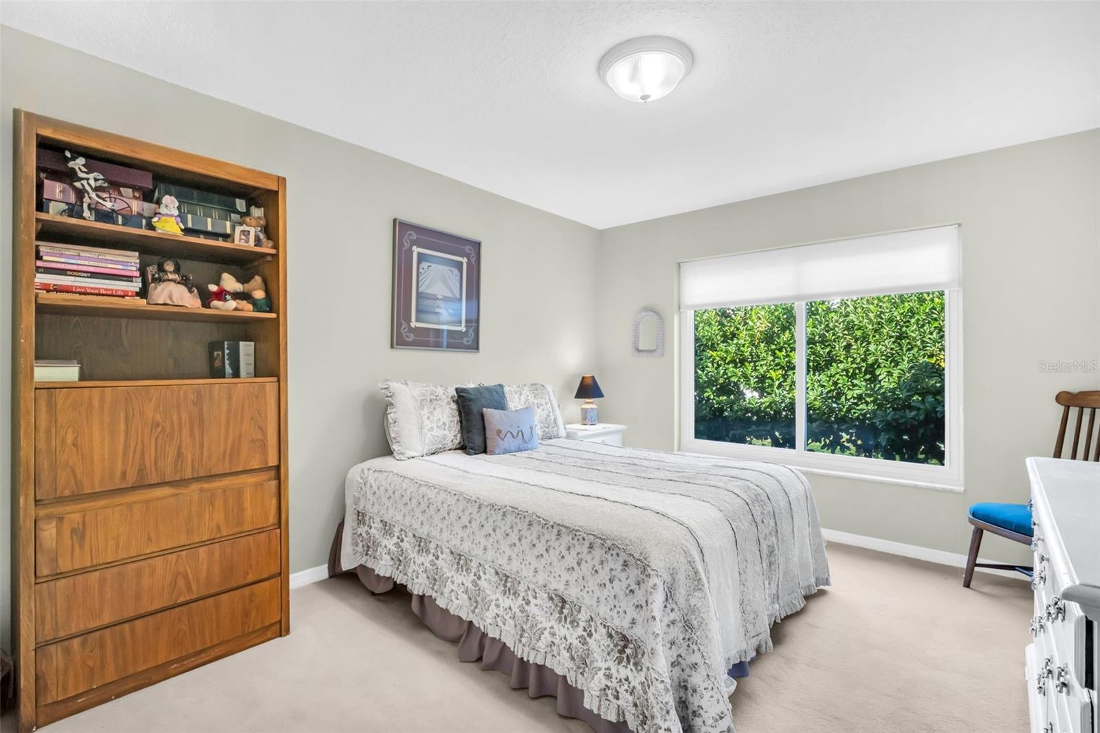 Spacious 2nd bedroom also offering private green views~