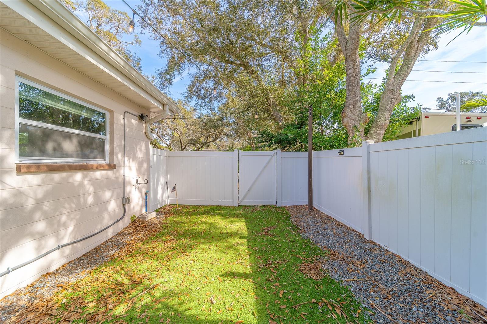 Gate on East Side of Home
