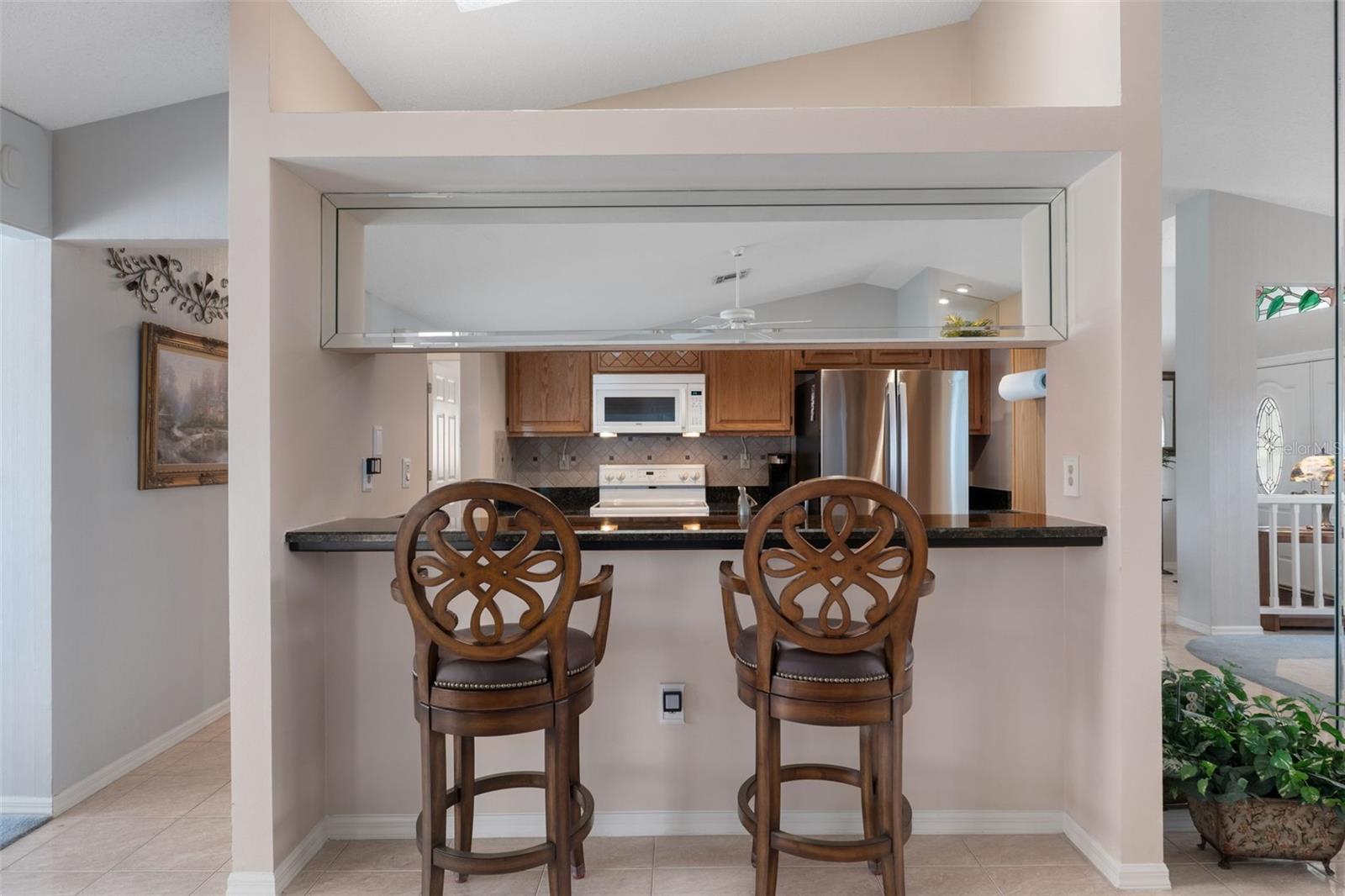 Additional seating at the bar means you can host numerous guests for dinner and not need any card tables or TV trays!