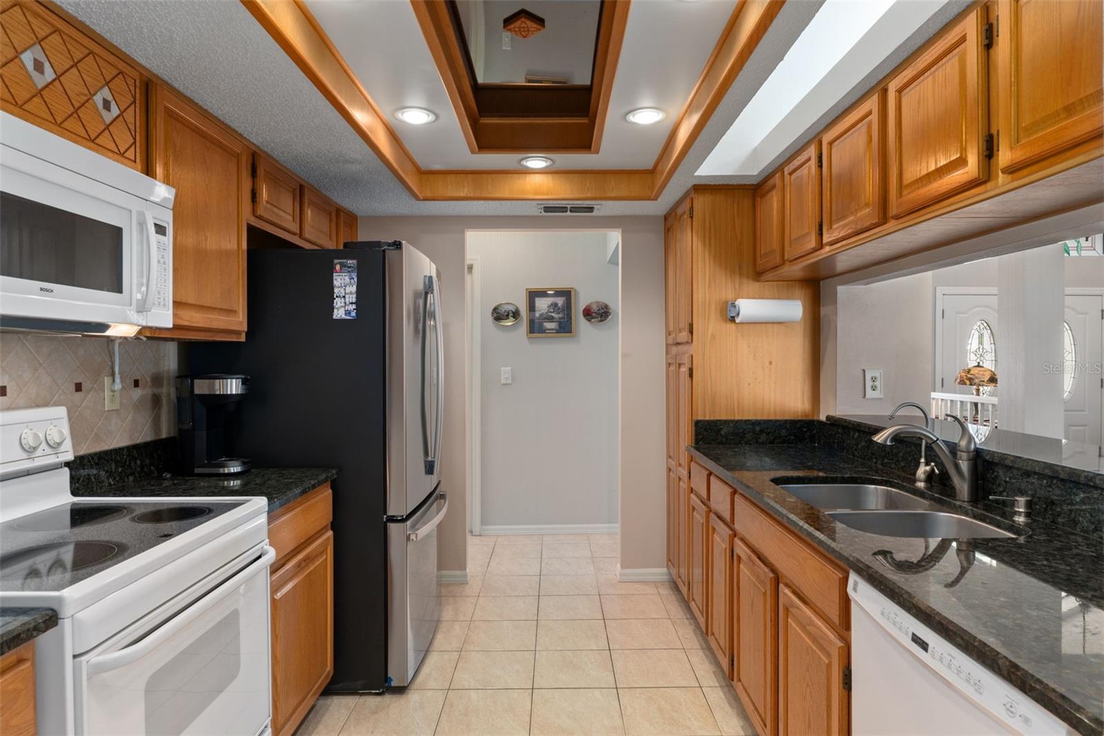 You won't miss any of the action in this centrally located kitchen!