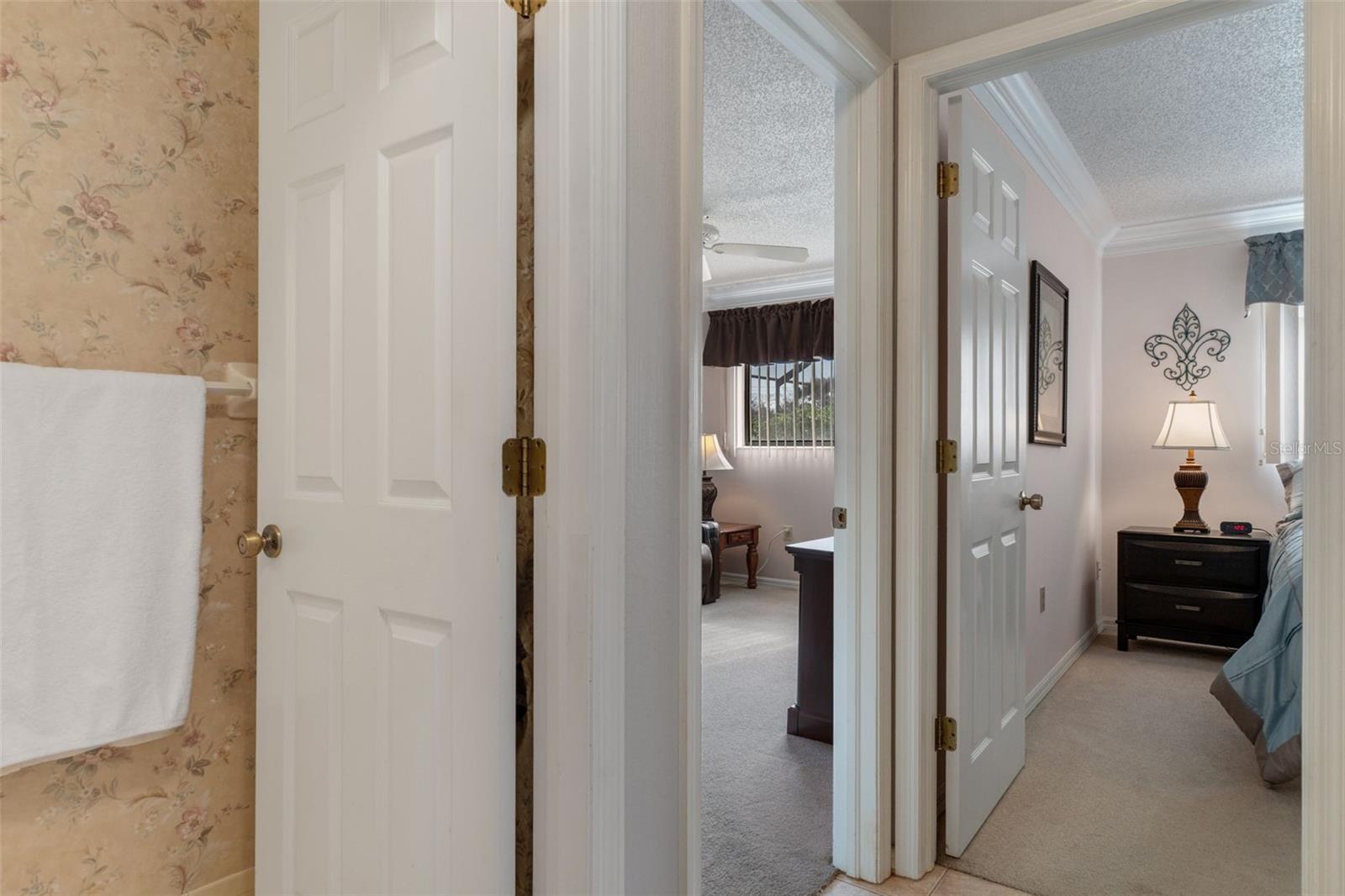 Secondary bedrooms and bath are on opposite side of the house