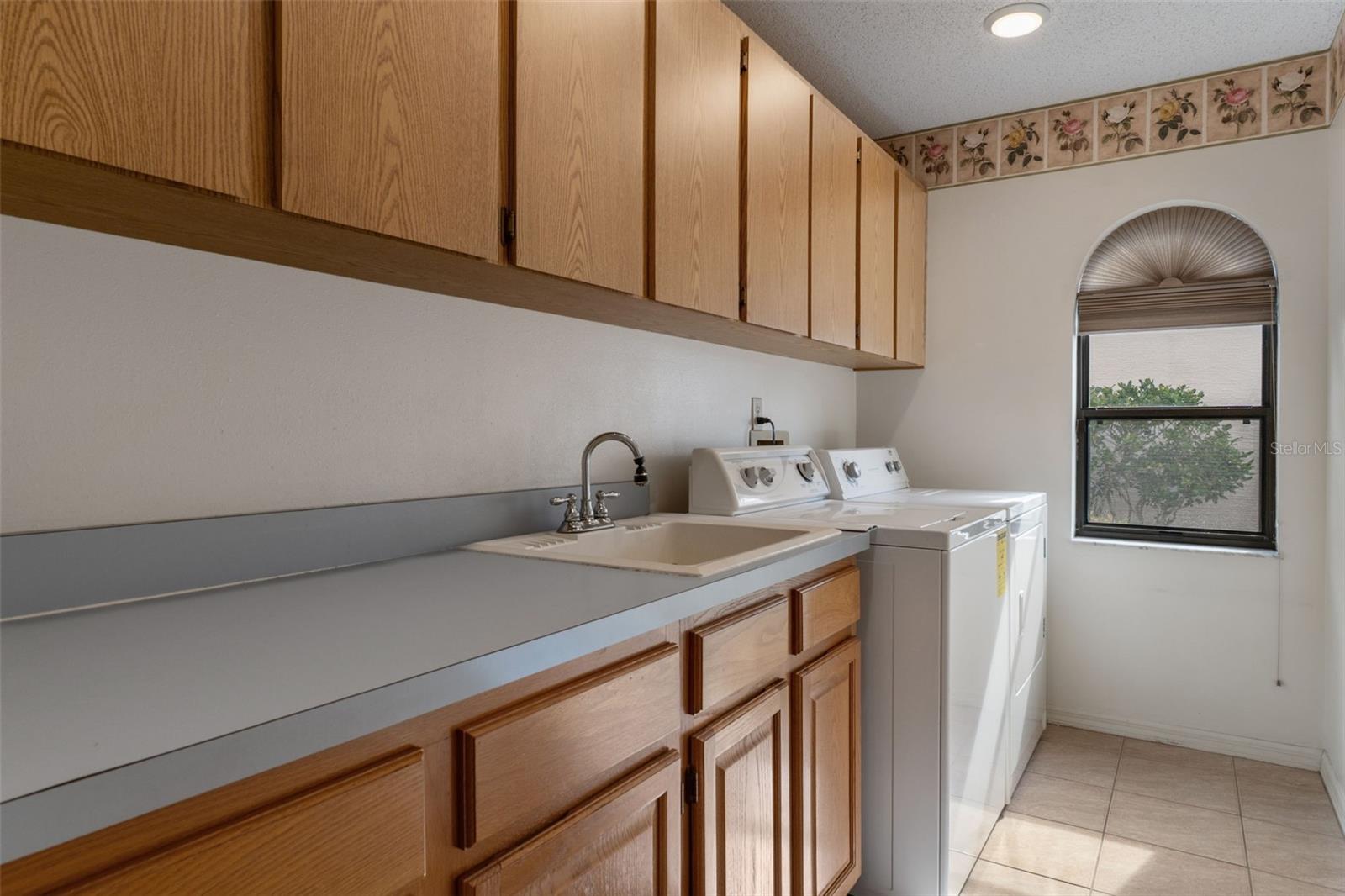 Utility Room is situated just inside the garage and can be closed behind a door if desired.