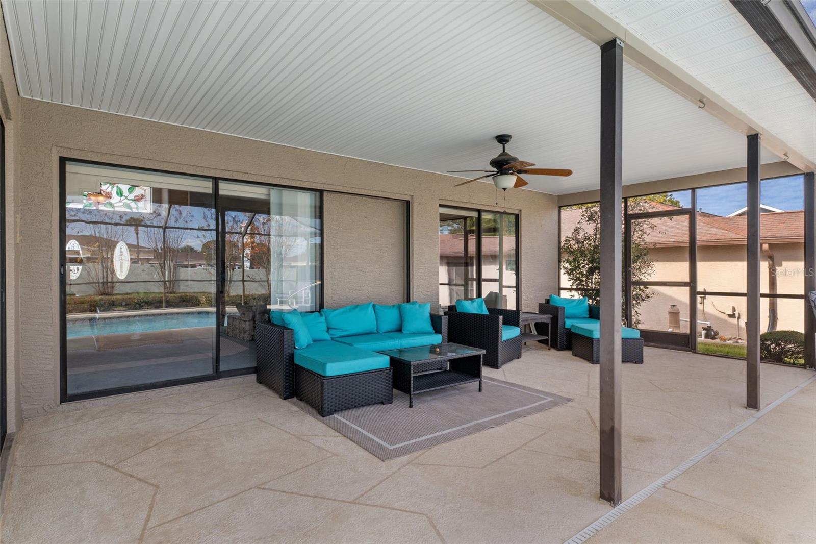 Crisp, clean and previously resurfaced patio deck.  Patio furniture does not convey.