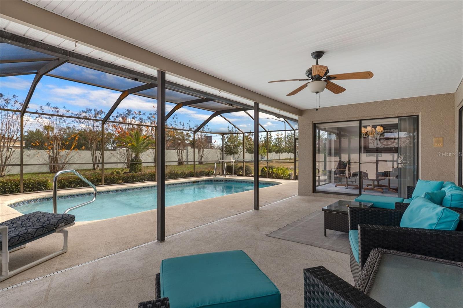 Newly rescreened enclosure helps keep bugs away while you enjoy your patio time!