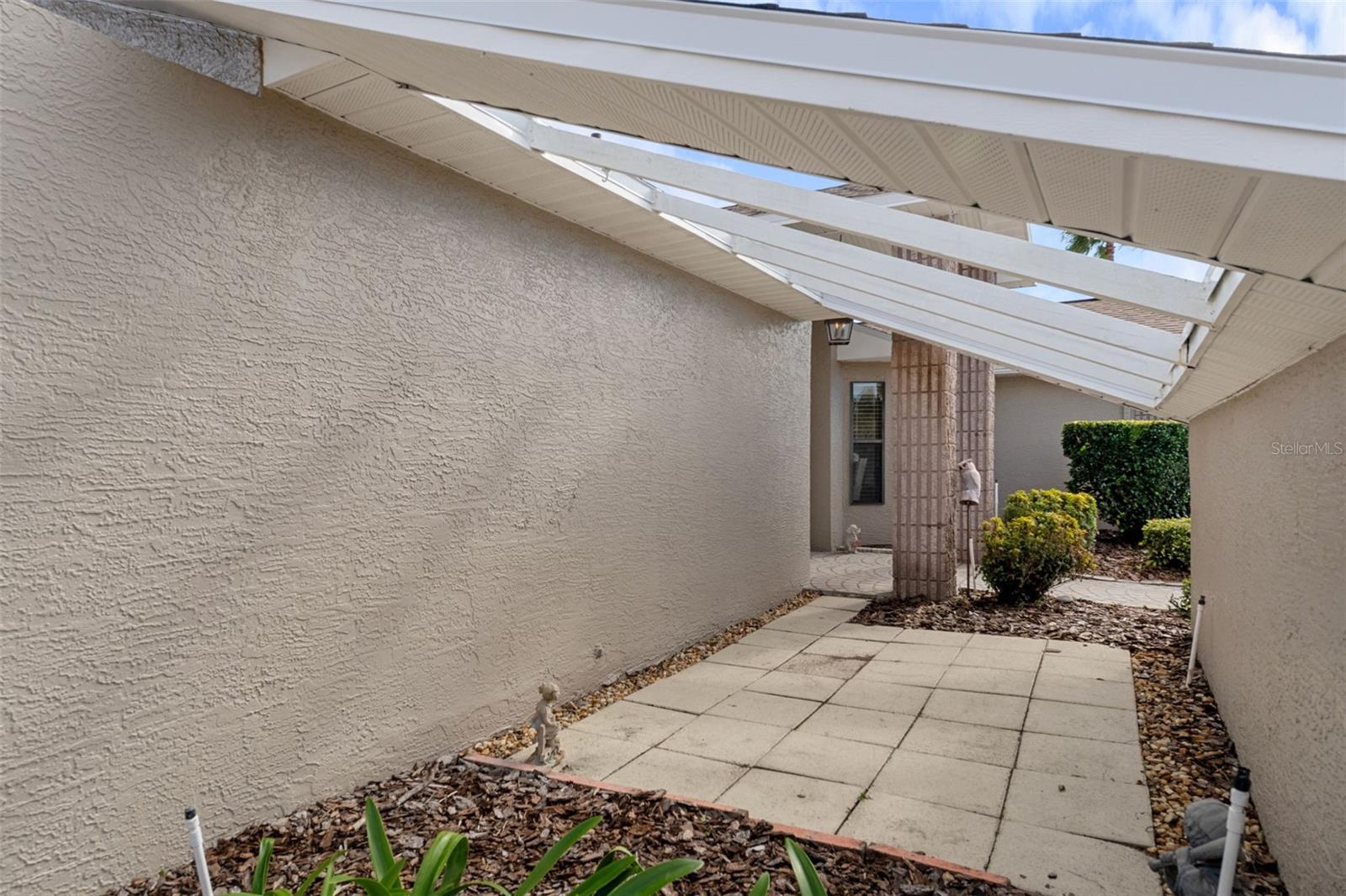Use your imagination for this space which could be used for a garden or a great spot for your potted plants!  It was once set up as a small sitting area.