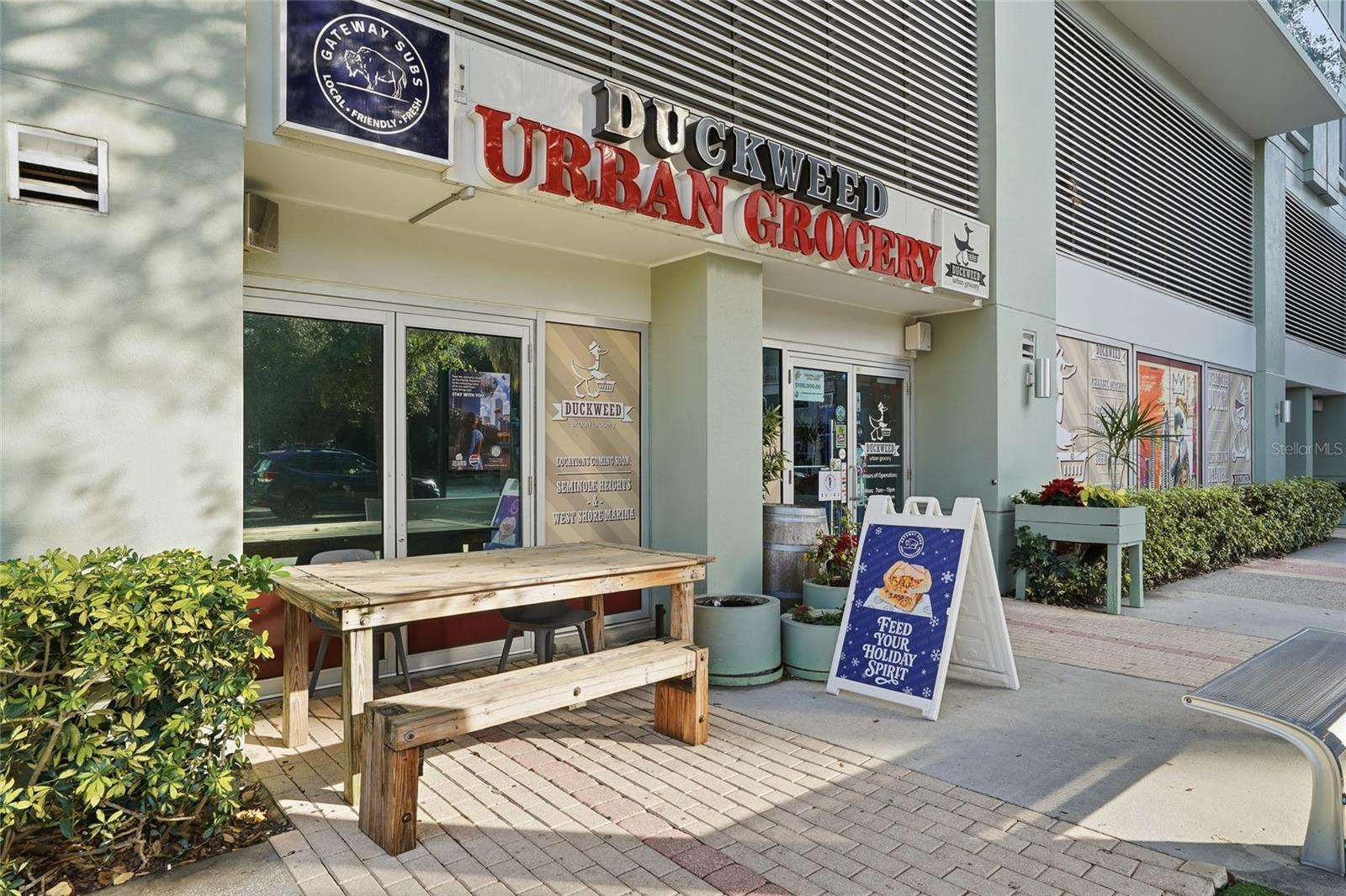 Duckweed Urban Grocery Store - In Base of Building