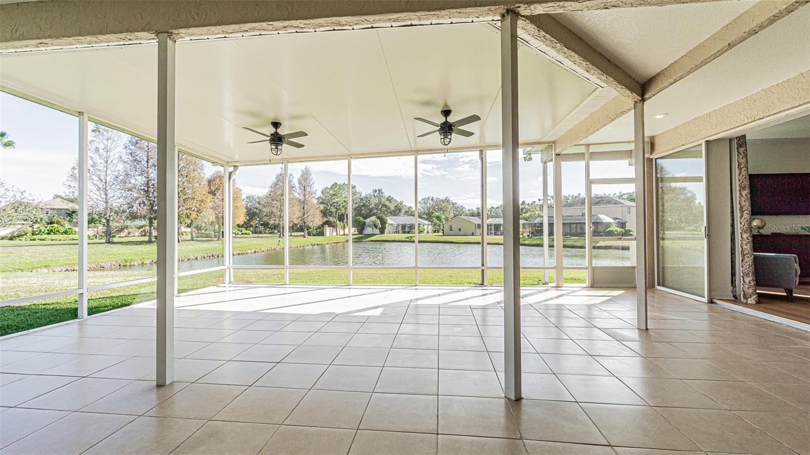 Expansive Covered Lanai with a serene water view!