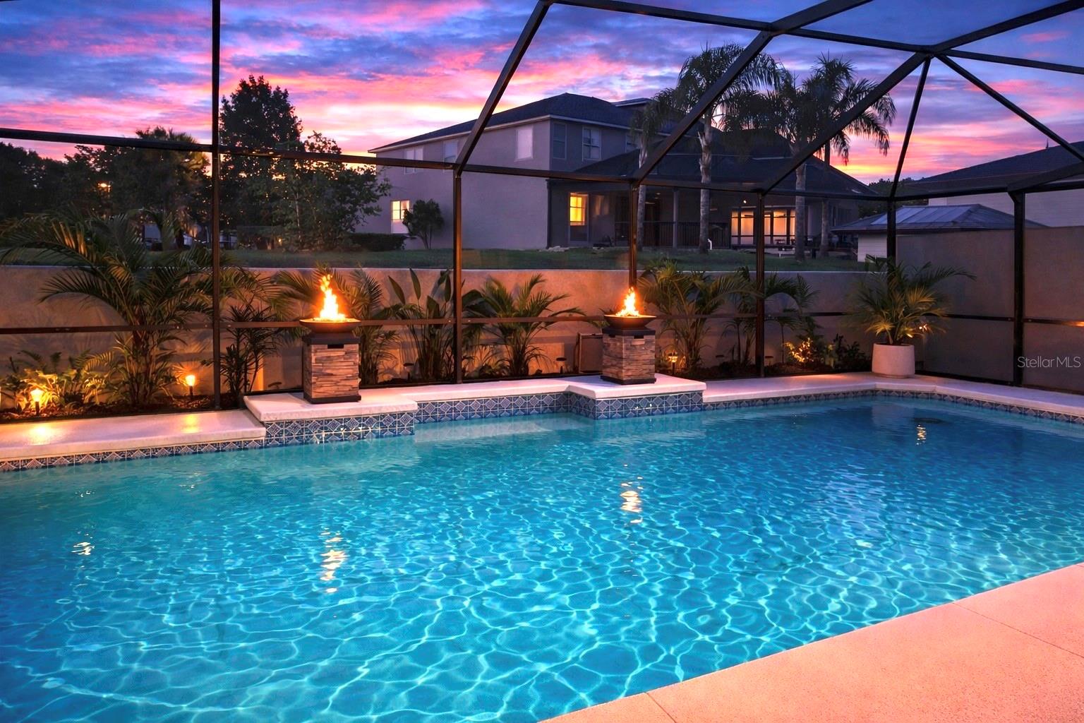 Enclosed Pool with Dual Firepits and Automated Functionality