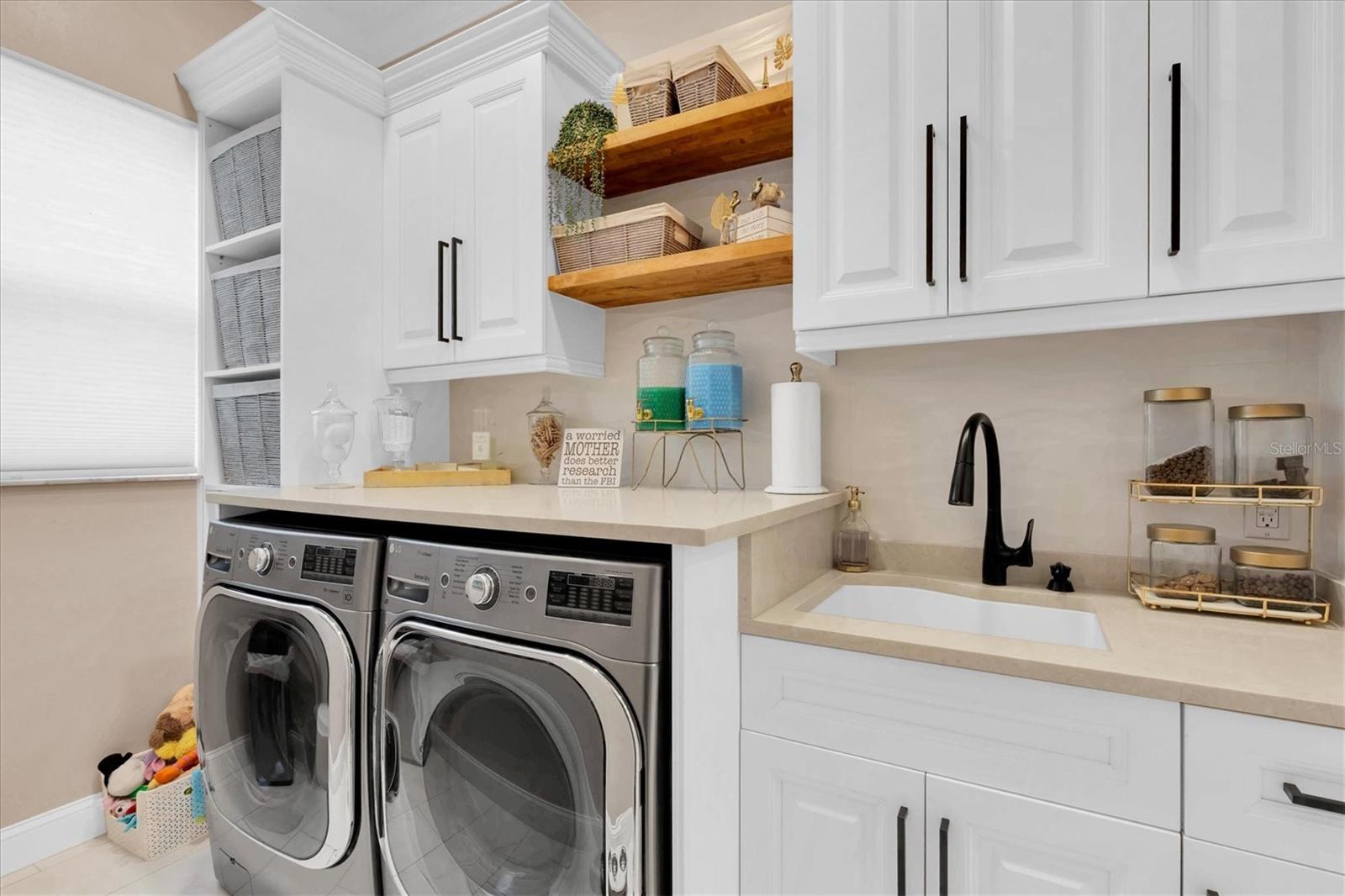 Custom Laundry Room with Storage and Built in Features