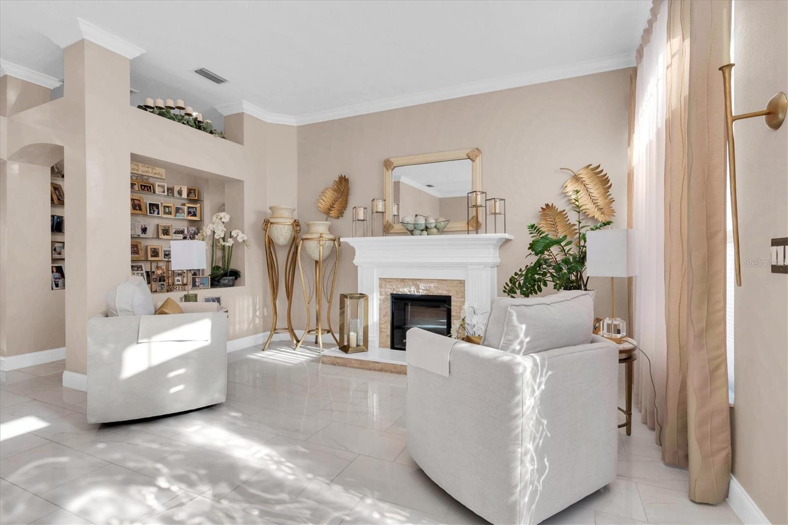 Formal Living Room with Fireplace and Custom Mantle.