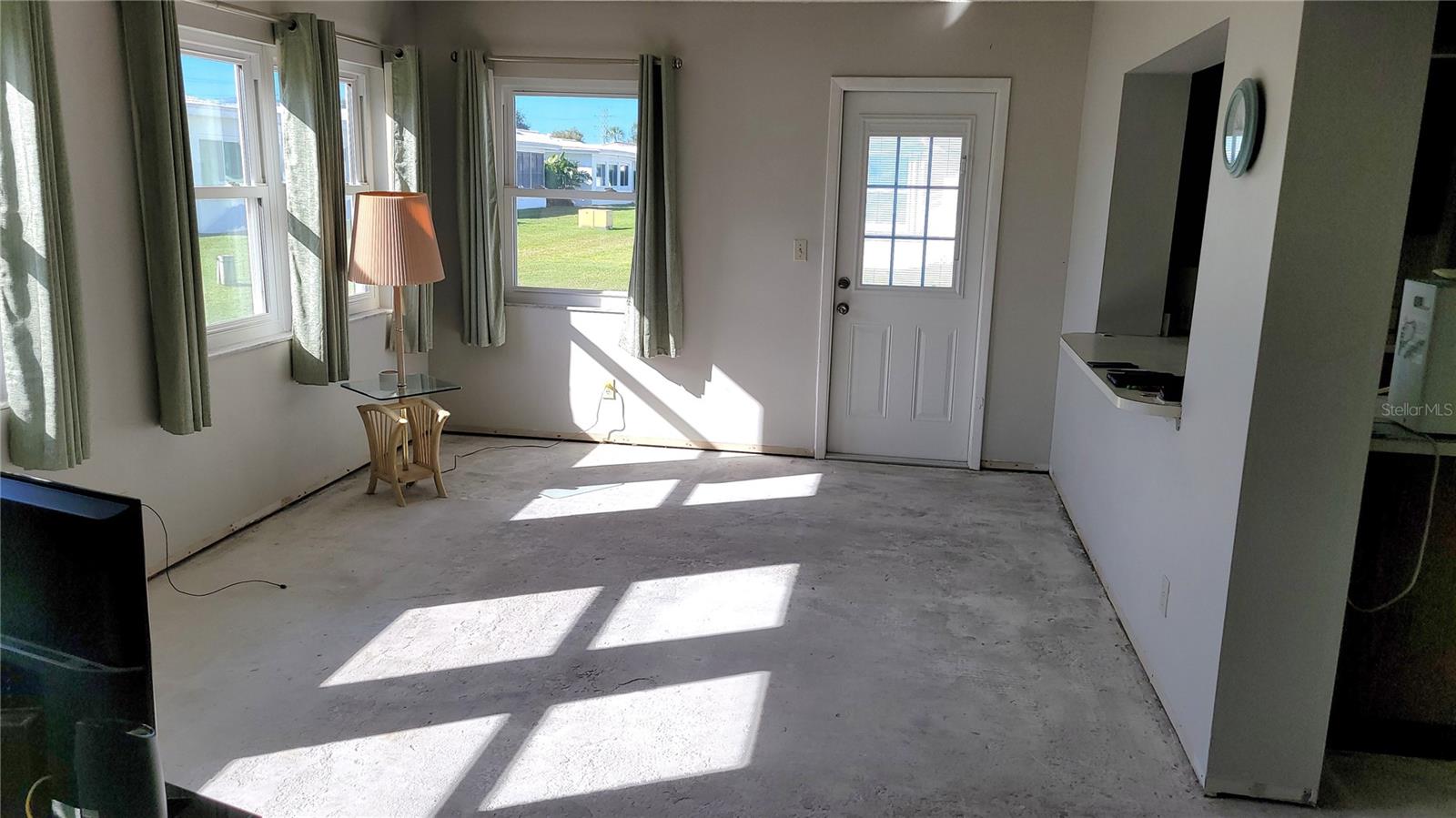 The 50+ year old carpets were pulled up from this Florida room making it ready for new floors.