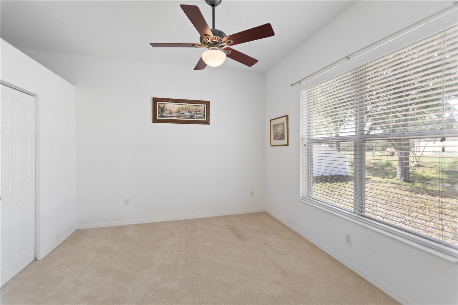 second bedroom with lake views and freshly cleaned carpets