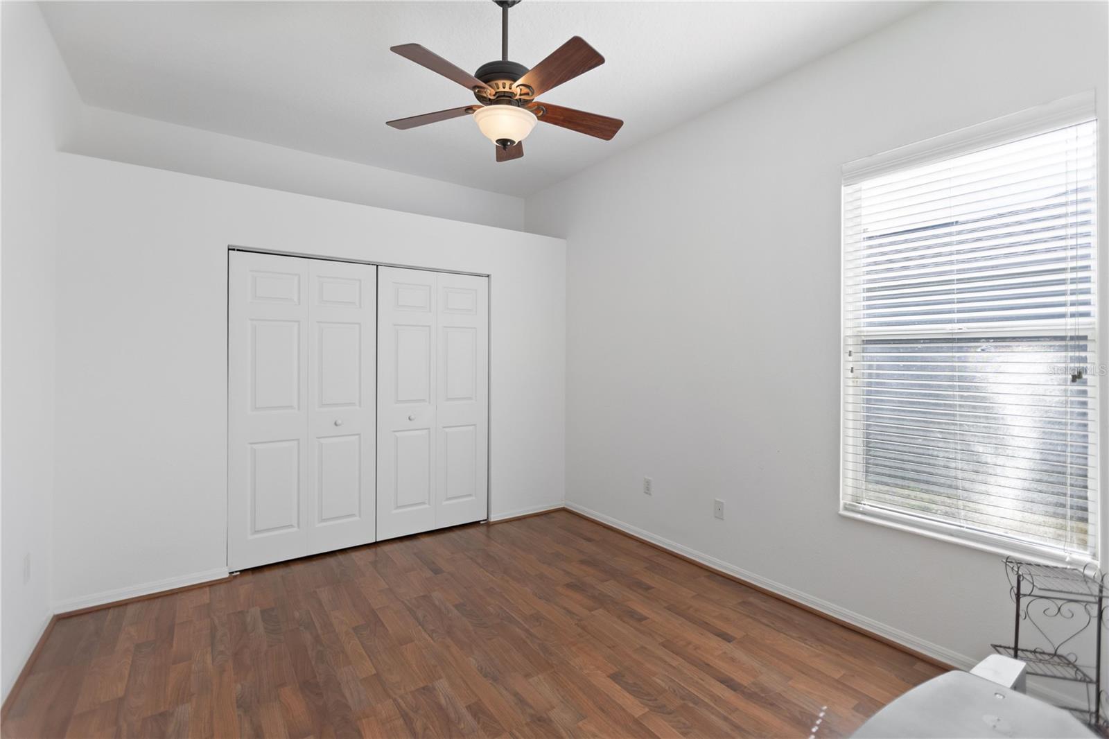 third bedroom with vinyl flooring