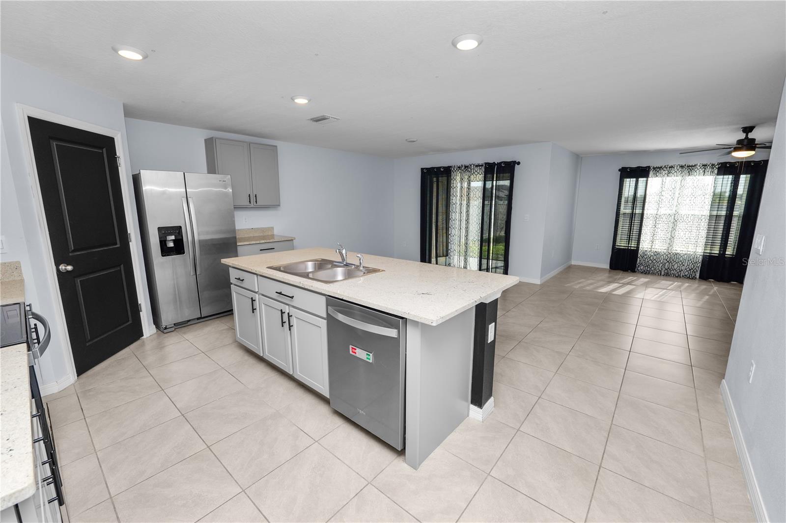 Open living, kitchen, dining room combo