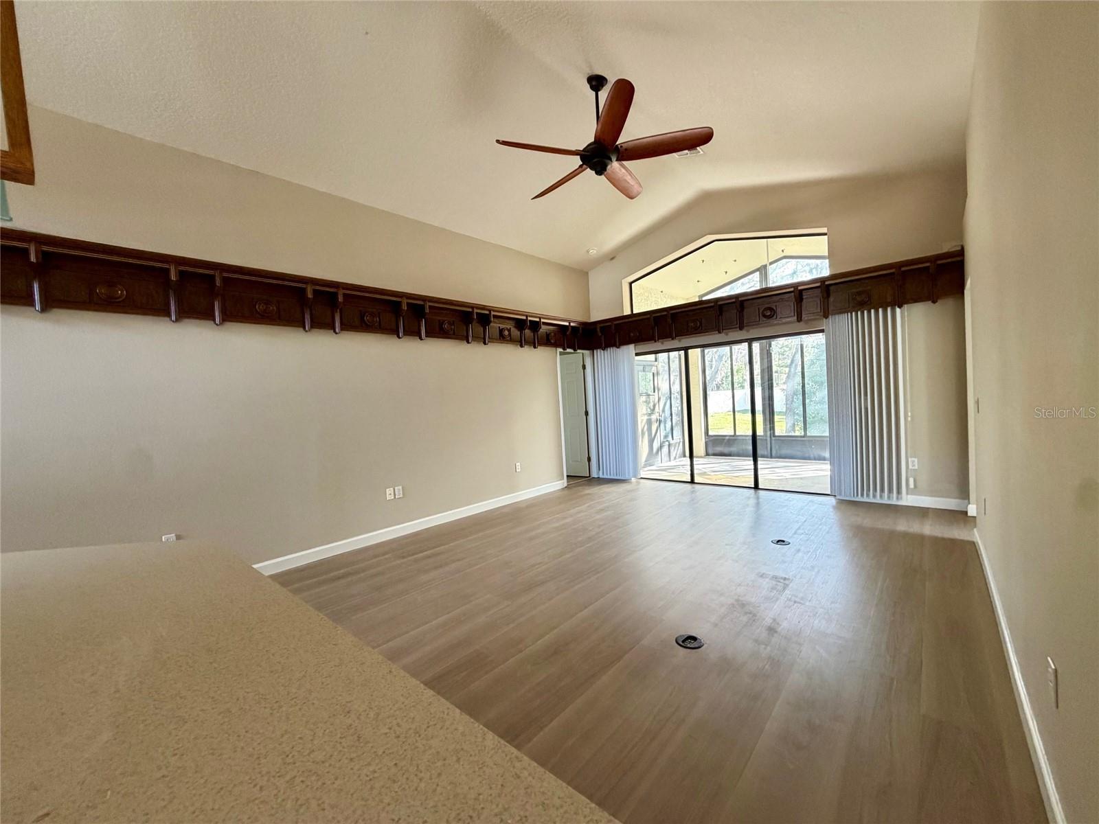 Living Room Ceiling Fan  Triple Sliding Glass Doors