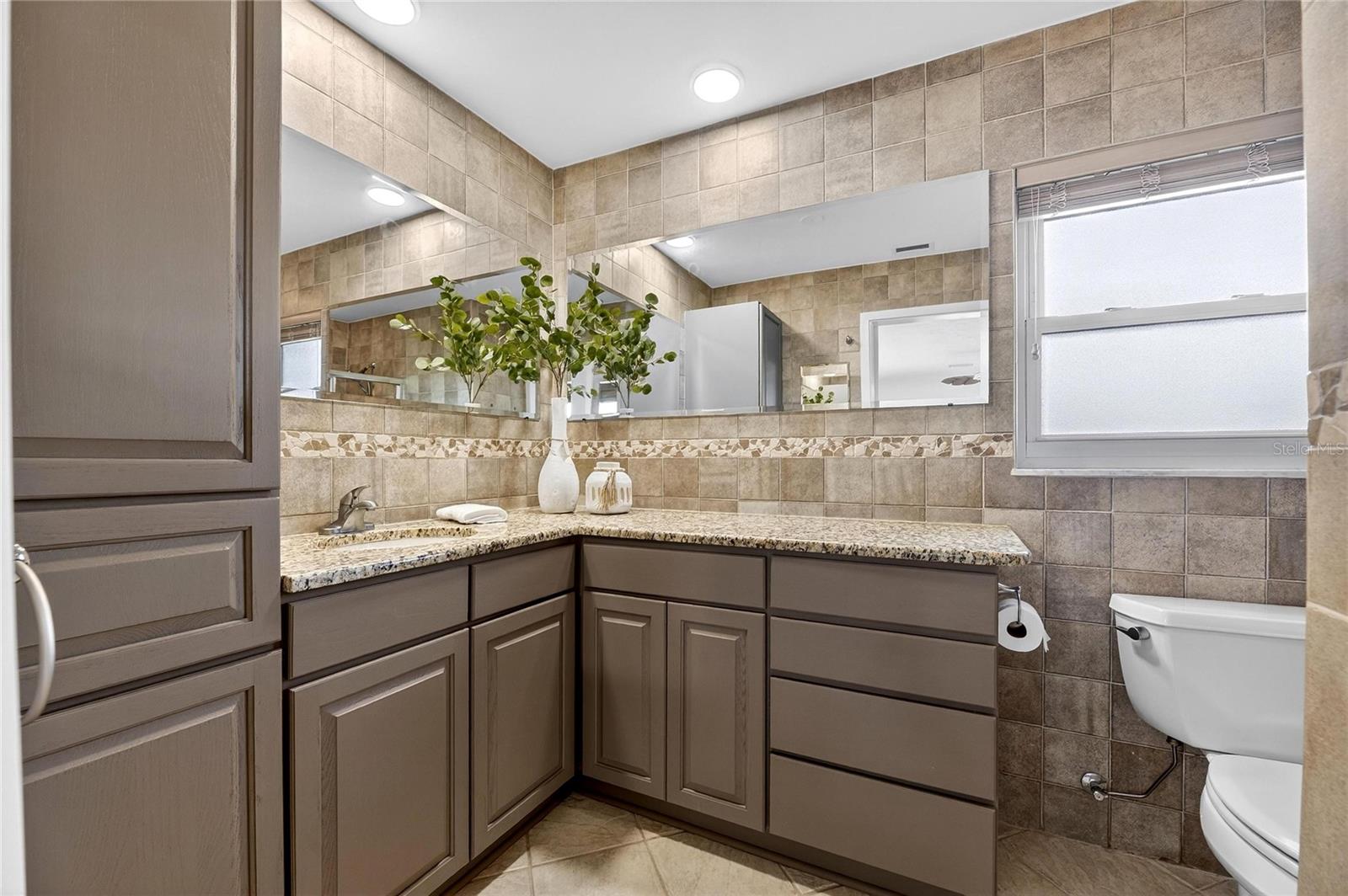 master bath restained cabinets