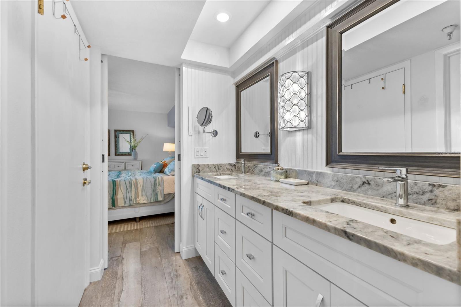 PRIMARY BATH ENSUITE WITH DUAL SINKS AND GRANITE COUNTERTOPS