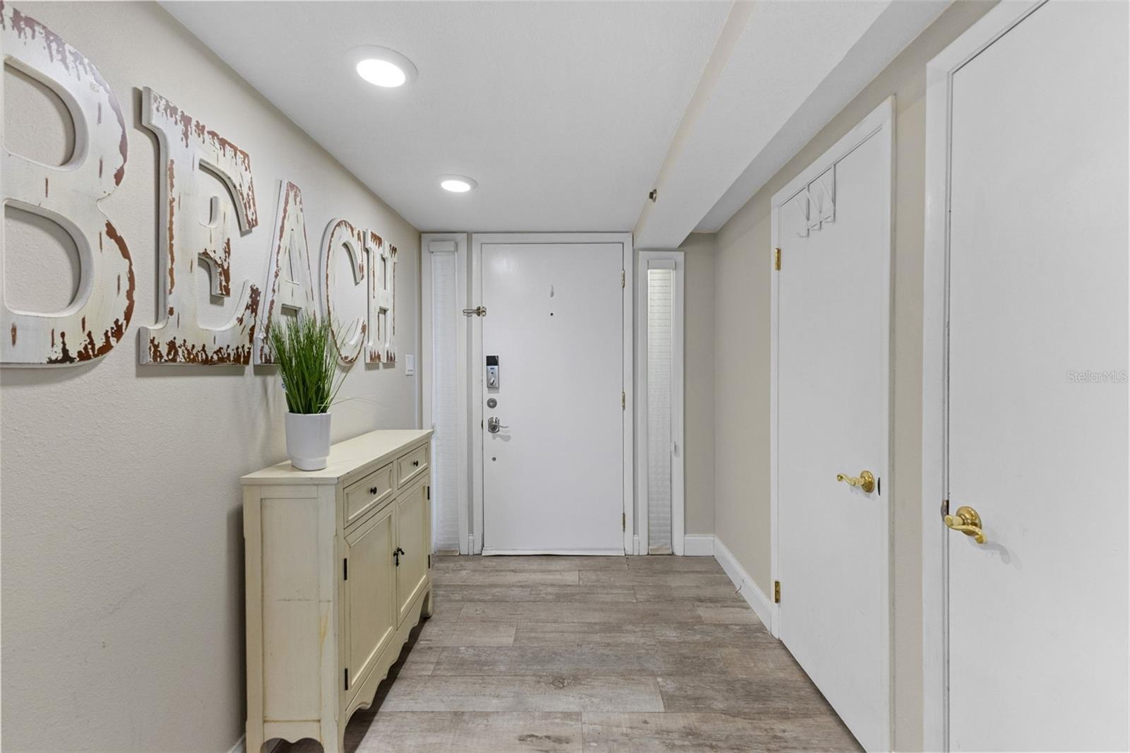 ENTRYWAY WITH STORAGE CLOSETS