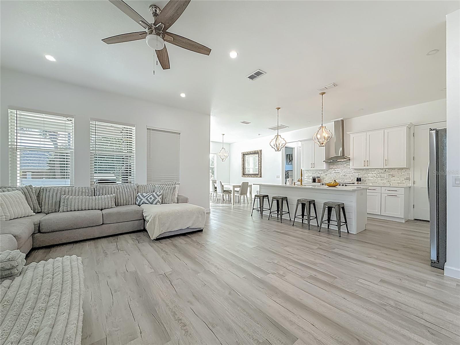 High ceilings, stunning finishes. Tons of storage in that kitchen!