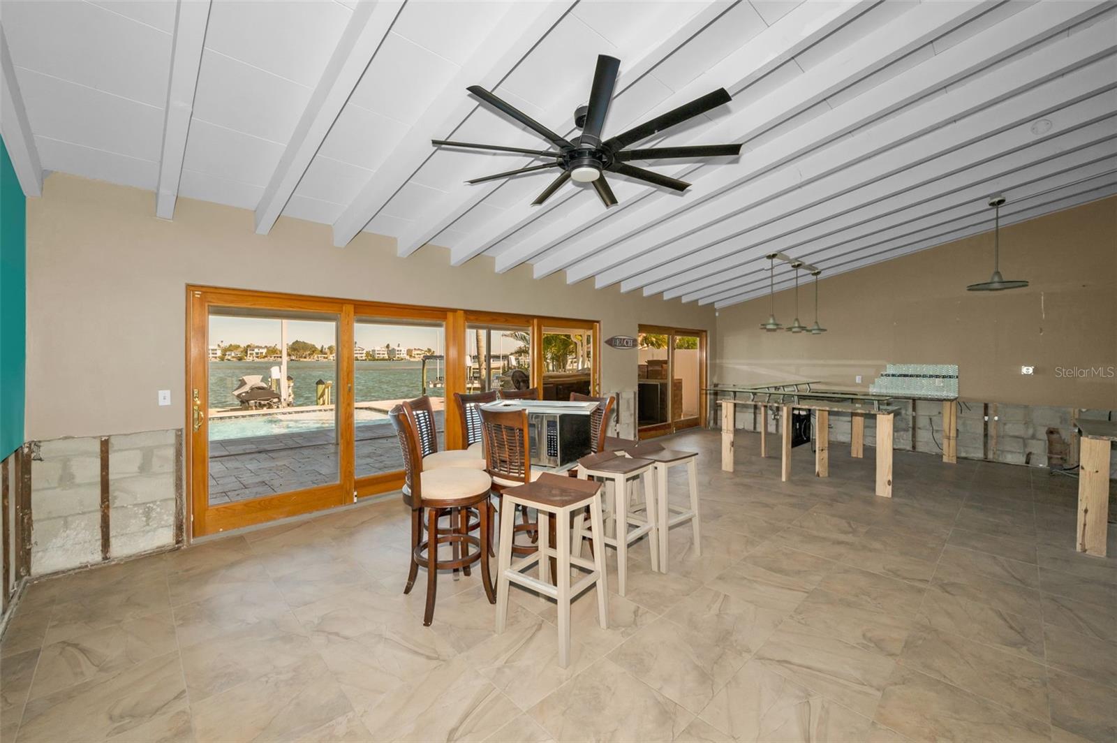 Wide open floor plan overlooking the Covered Lanai and Pool