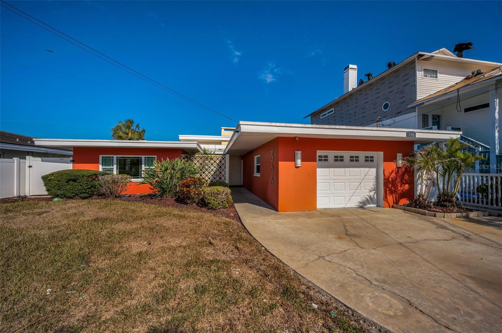 Mid-Century Block Home in one of IRB's FINEST Locations!
