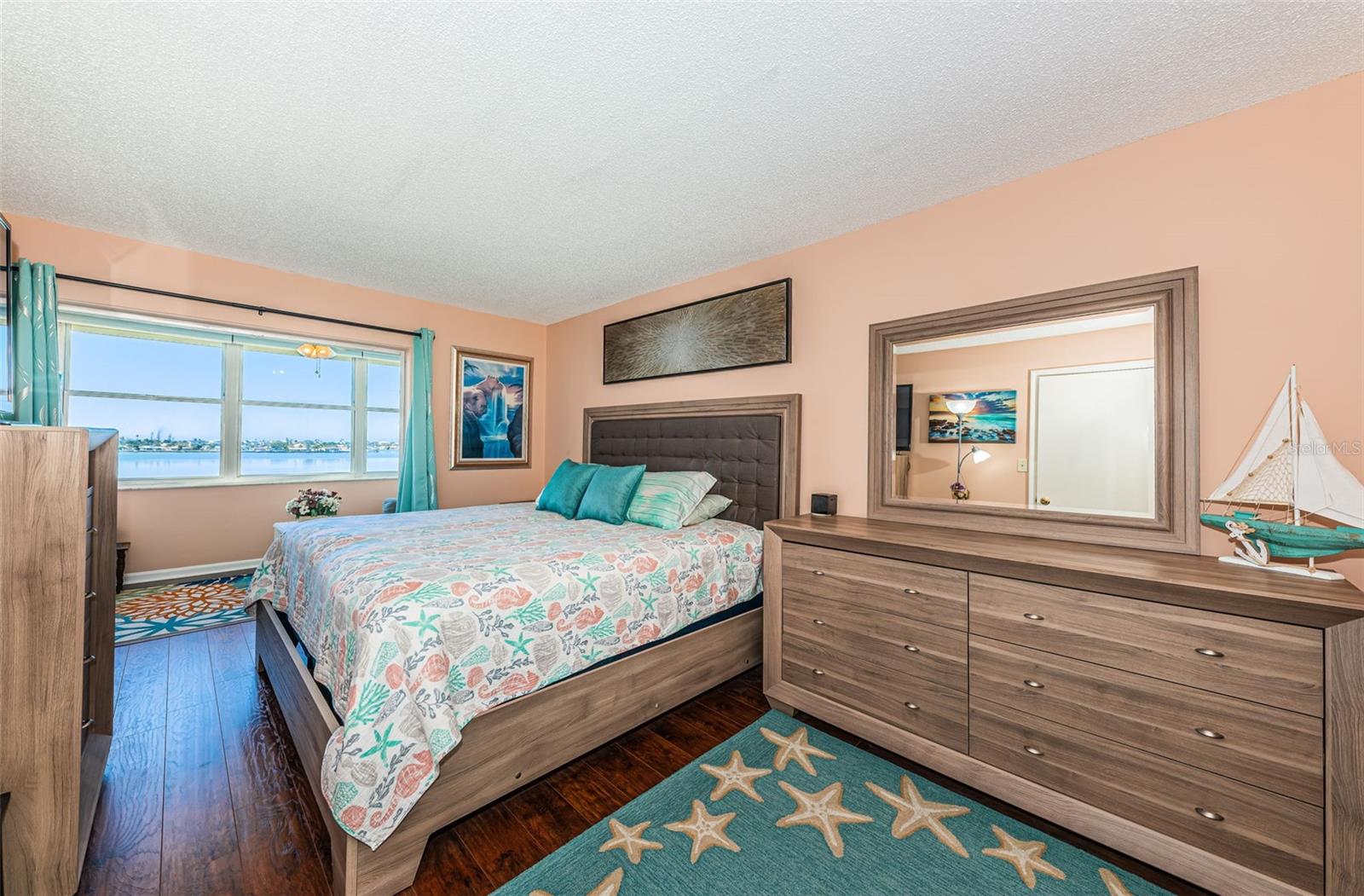 Large primary bedroom open to Florida room
