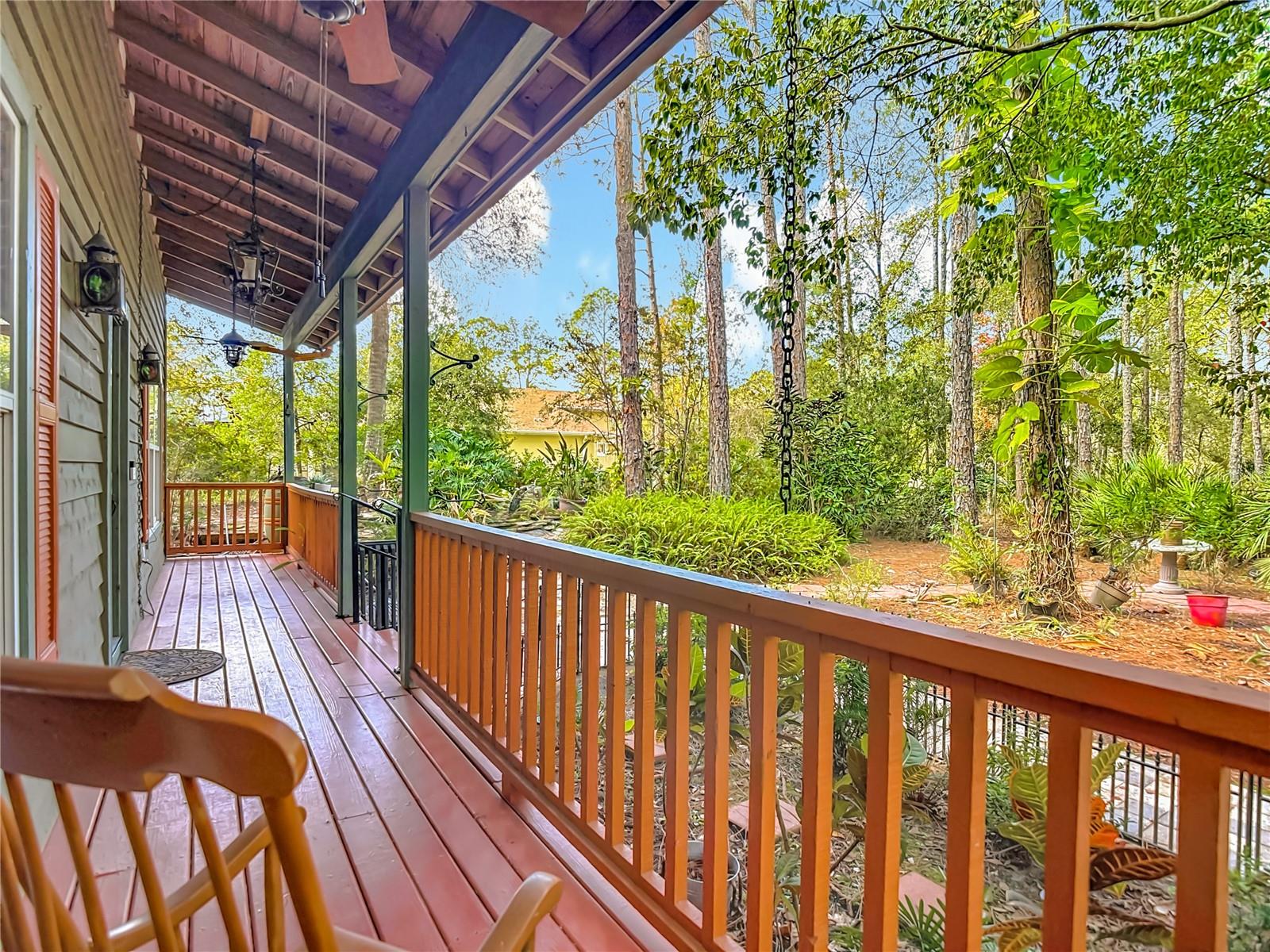 Beautiful Front Porch runs the length of the home