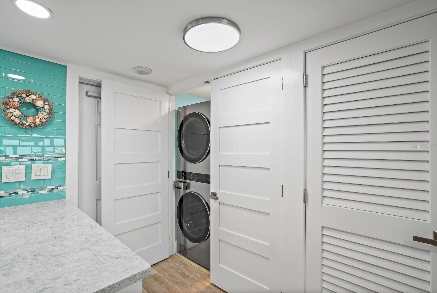 washer and dryer conveniently located near the kitchen