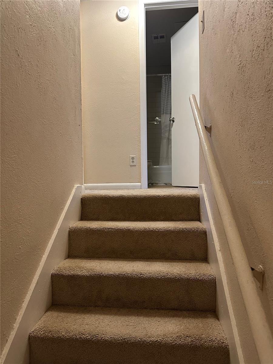 Second flight of stairs.