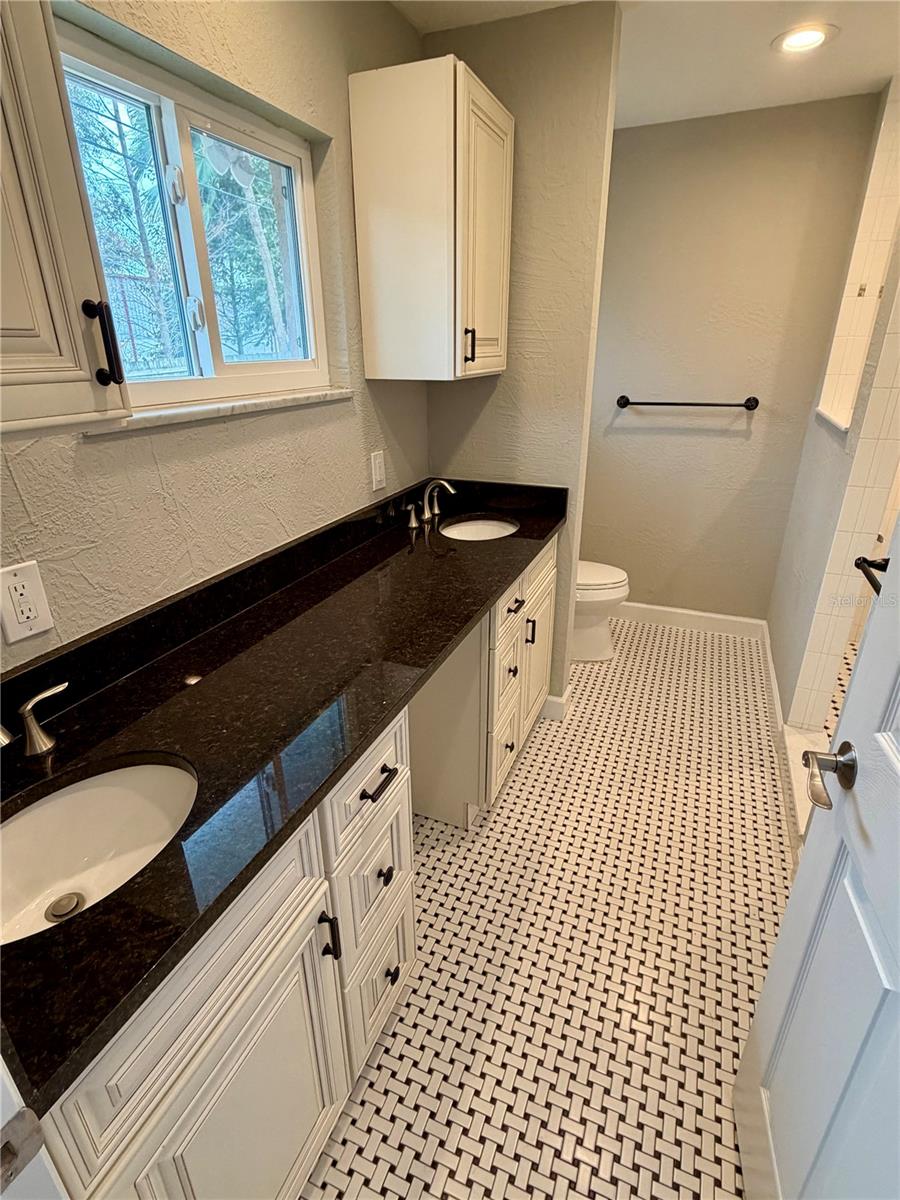 Double sinks, spacious walk-in shower