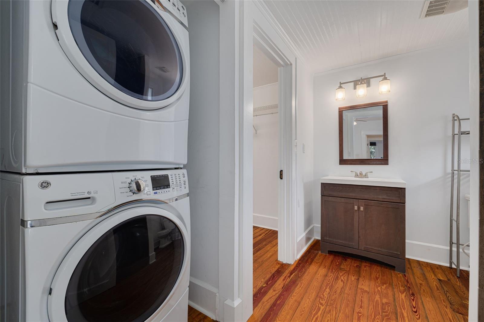 Primary Ensuite Bath and laundry closet