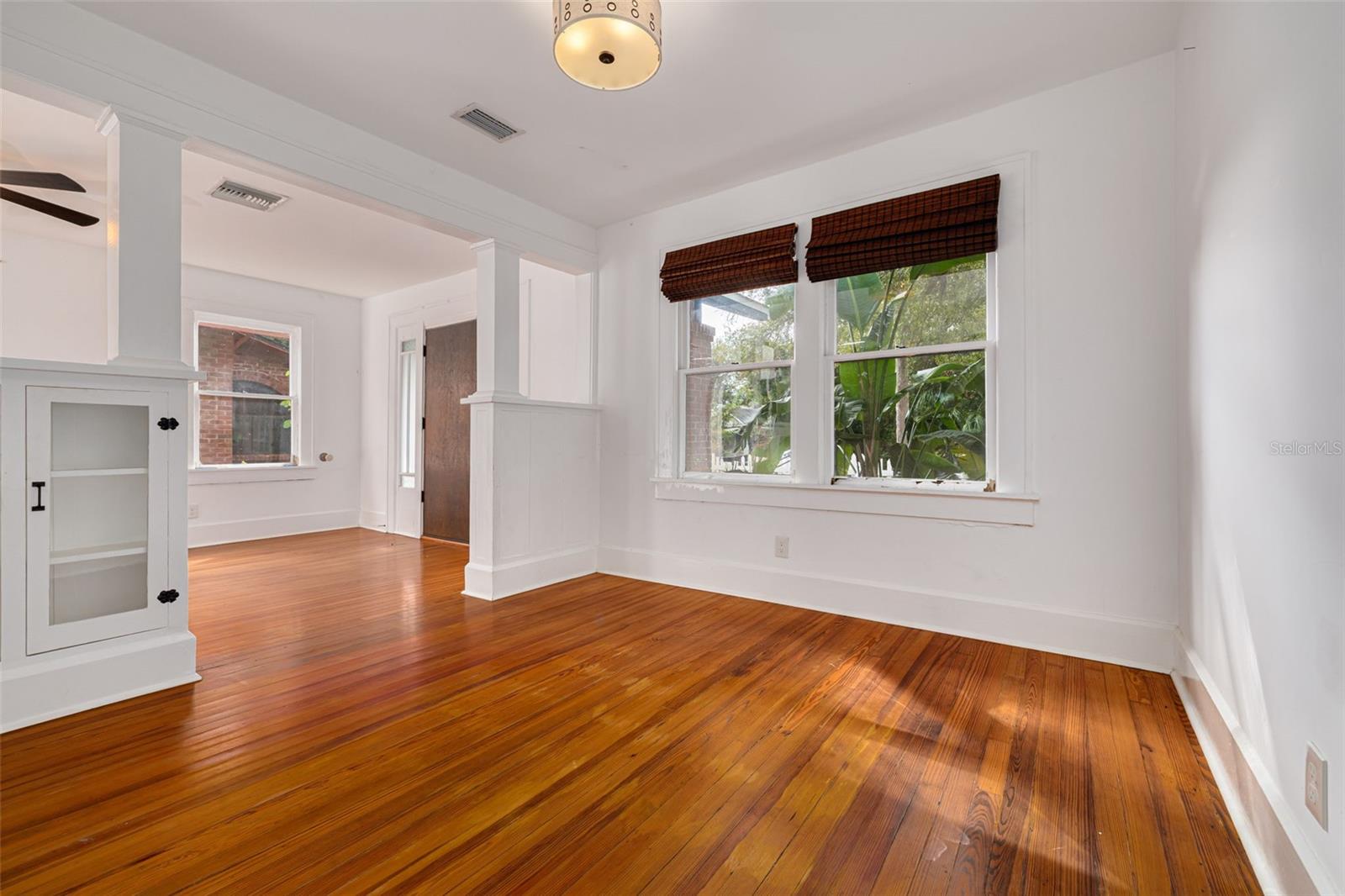 Overlook the front yard from your dining space