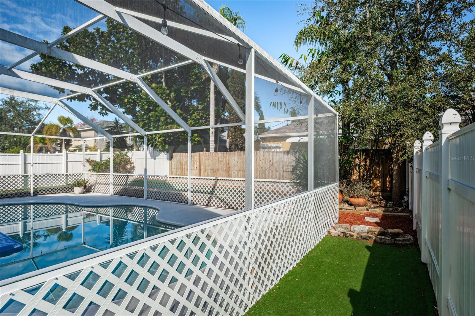 Note Turf between pool deck and fencing