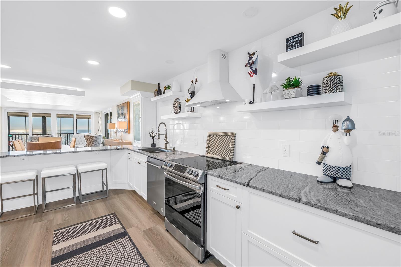 Kitchen With Endless Gulf Views, Quartz, Stainless and Breakfast Bar
